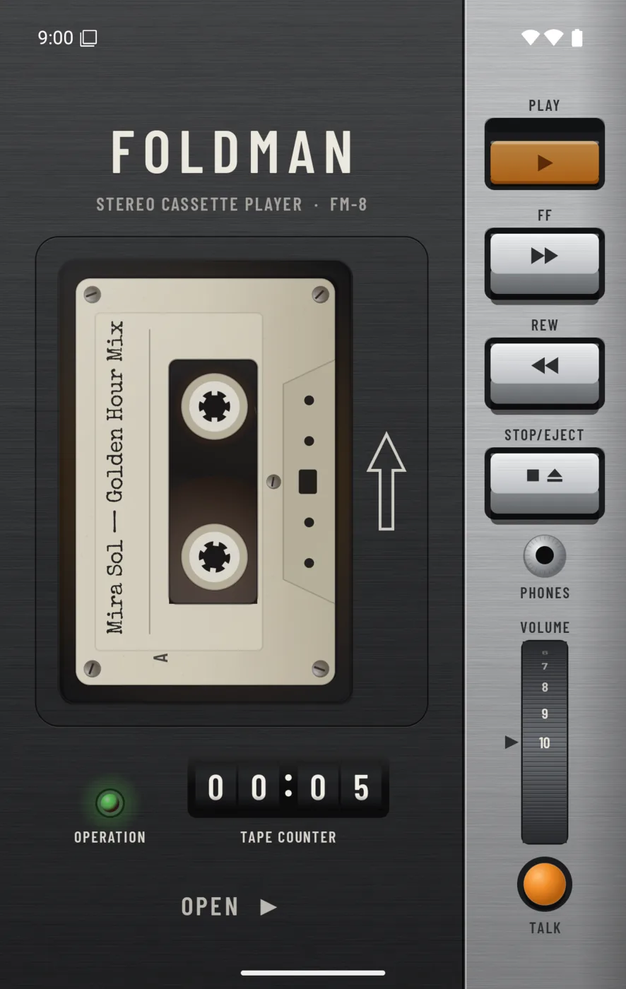 Foldman's cover screen: a cream cassette playing in a graphite deck, with PLAY, FF, REW and STOP/EJECT piano keys, a tape counter and a volume wheel.