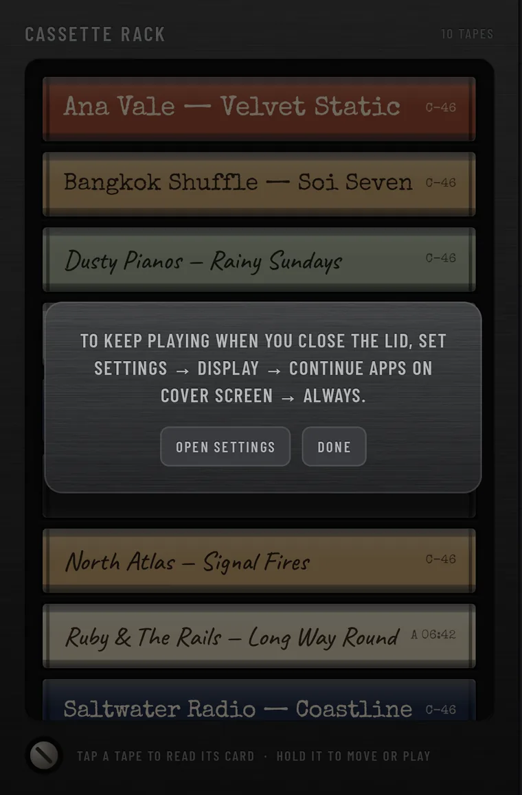 The second first-run card: to keep playing when you close the lid, set Settings, Display, Continue apps on cover screen to Always. Buttons OPEN SETTINGS and DONE.