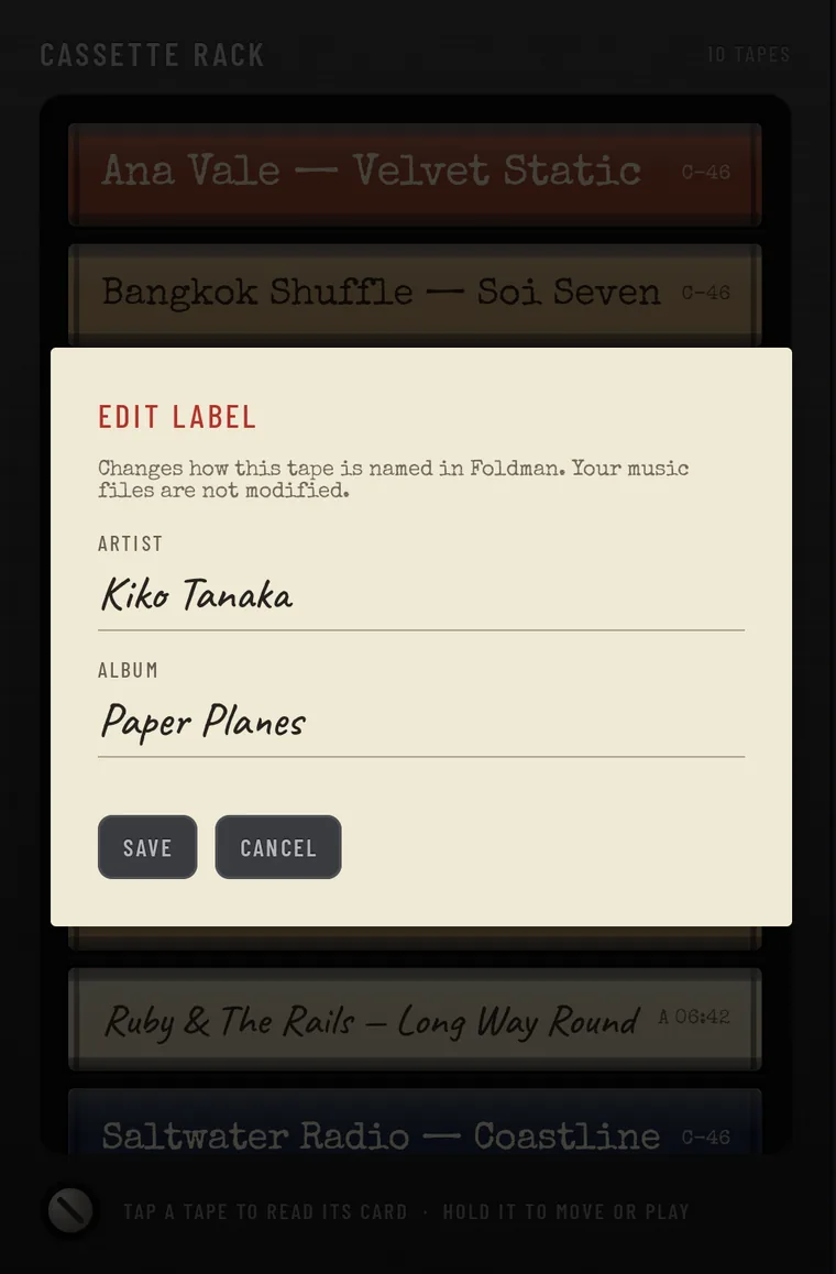 EDIT LABEL: changes how this tape is named in Foldman, your music files are not modified. Fields ARTIST, Kiko Tanaka, and ALBUM, Paper Planes, with SAVE and CANCEL.